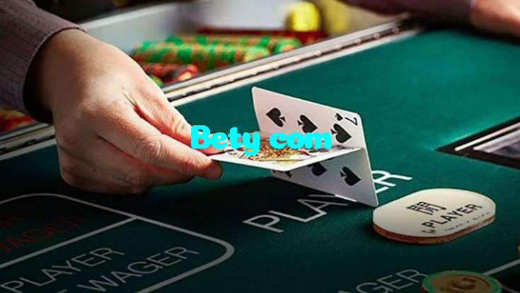 Bety com casino presented on mobile device in Pakistan with slots and live games